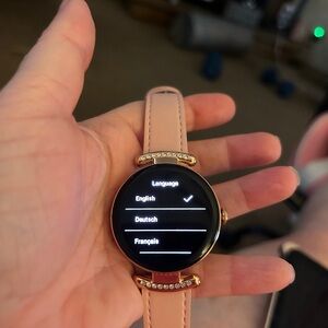 Source Unknown Gold and Pink Smartwatch